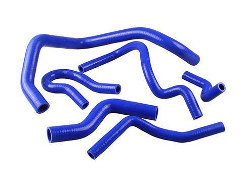 Several blue colors car silicone hose kits in different sizes on the white background.