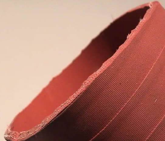 Generally speaking, a qualified silicone hose should be smooth. Obviously, this wrap finish makes it unqualified and not suitable for usage.
