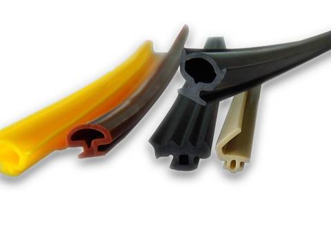 Five silicone strip on the white paper with different colors.